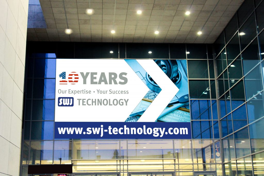 SWJ Technology 10-Years Banner am Halleneingang, Großformat