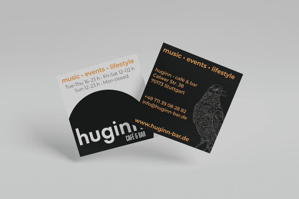 Zwei quadratische huginn Visitenkarten in Schwarz/Orange